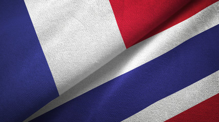 France and Thailand two flags textile cloth, fabric texture © Aleks Taurus