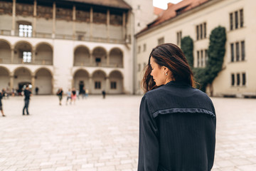 Fototapeta premium Pretty pan asian tourist girl walking in the tourist place outdoor.