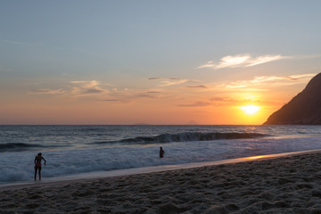 beautiful sunset on the beach of itacoatiara in niter&oacute;i, rio de janeiro, brazil