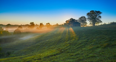 Farm at Sunrise with Fog