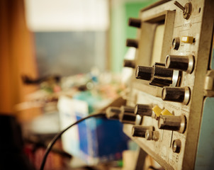 vintage measuring device with connectors closeup