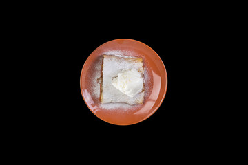 Strudel with an apple , served on the ceramic plate with the ice cream.