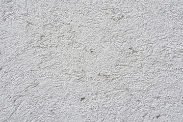 White cement wall texture background.Cement stucco wall with randomly plastered finishing.