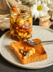 honey and nuts grain, tasty and healthy dessert. top food background. copy space