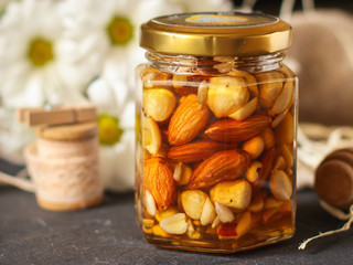 honey and nuts grain, tasty and healthy dessert. top food background. copy space