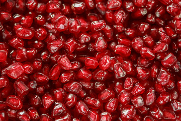 Fresh pomegranate seeds as a food background