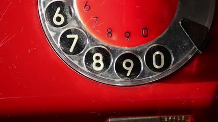 Dialing a Number on Retro Rotary Red Phone - Powered by Adobe