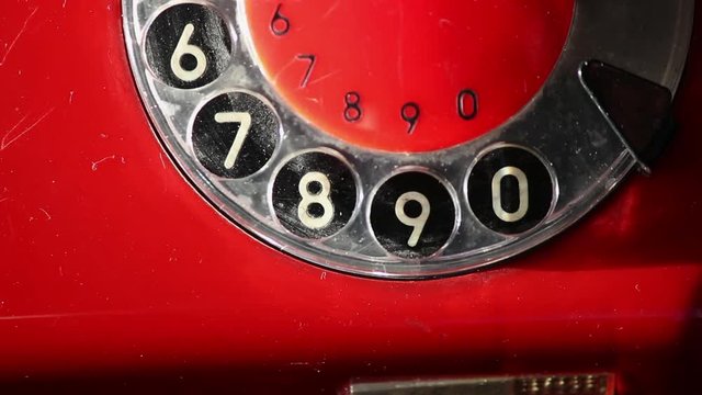Dialing a Number on Retro Rotary Red Phone