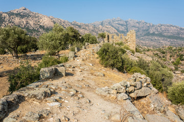 Rocky landscape around Lake Bafa in Turkey with ruins of Herakleia.
