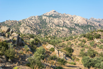 Fototapeta na wymiar Rocky landscape and Besbarmak mountain near Lake Bafa in Turkey.