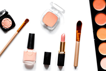 decorative cosmetics nude on white background top view