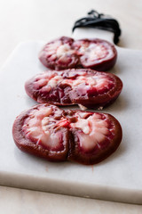 Sliced Raw Lamb Kidney on Marble Board.