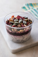 Healthy Chia Pudding with Pumpkin Seeds / Acai Bowl in Plastic Cup