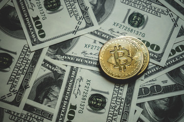 Bitcoin gold coin (cryptocurrency) on us dollar - can use for financial and business background - Image