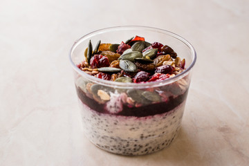 Healthy Chia Pudding with Pumpkin Seeds / Acai Bowl in Plastic Cup