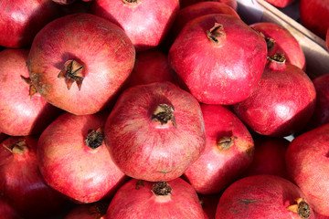 Rows Of Pomegranates. Pomegranate Closeup, Background. Group Of Ripe Pomegranates