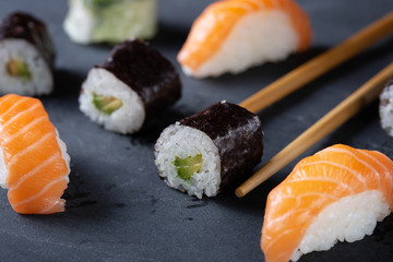 Fresh seafood sushi meal on darck background