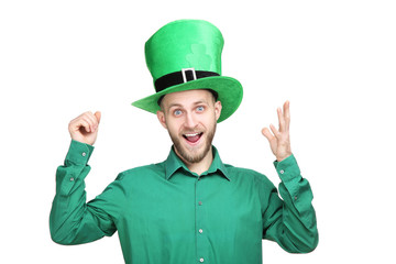 St. Patrick's Day. Young man wearing green hat on white background