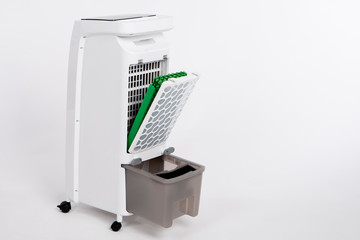 Replacing filters in the air purifier. Purification of air in the room. Replacing filters for air...