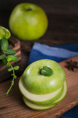 Set of green fruits for healthy diet and detox: apple, lime, kiwi, mango, carambola and mint.