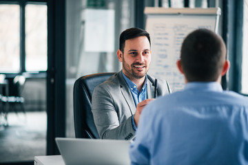 Two business men on meeting.