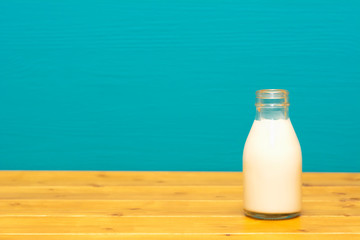 Fresh creamy milk in a one-third pint glass bottle