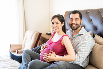 Attractive Expectant Couple Spending Leisure Time