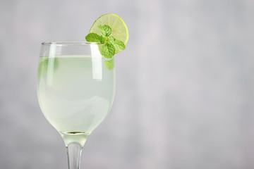 Lime juice, limes slice with mint leaves on table, Fresh drink lemonade.