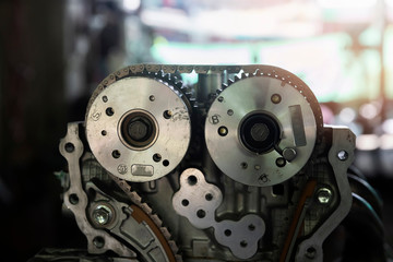 Fototapeta premium Car engine parts in the car repair garage.