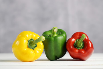 Sweet pepper on white wooden table.