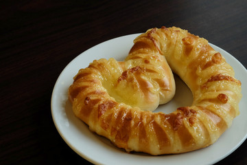 Heart shape sweet bread on white dish and space for write wording, special recipe and design for coming valentine’s day, promotion strategy for up selling in special season greeting