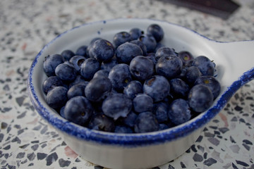Blueberries in a white plate