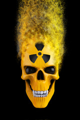 Yellow radioactive skull disintegrating into particles - 3D Illustration