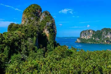 Beautiful view on Railay west beach from view point. Tropical beach with karst rock formations on...