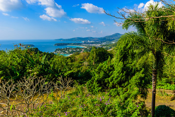 Fototapeta na wymiar Karon View Point - View of Karon Beach, Kata Beach and Kata Noi in Phuket, Thailand. Landscape scenery of tropical and paradise island. Beautiful turquoise sea and blue sky on summer day.