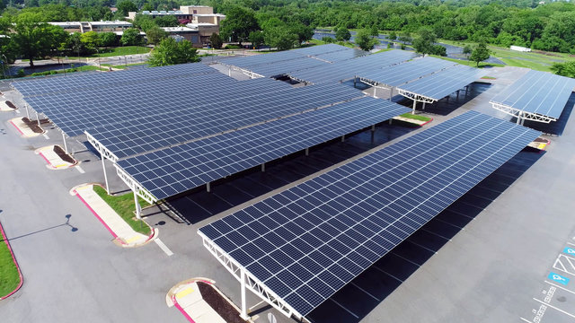 aerial view solar panels in parking