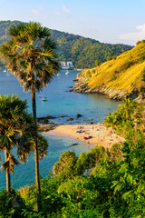 Yanui Beach is a paradise cove located between Nai Harn Beach and Promthep Cape in Phuket, Thailand. On a sunny summer day at sunset.