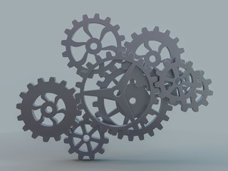 A cluster of interlocking metal gears. 3D