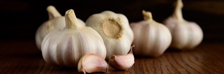 Garlic bulb on the wooden vintage background