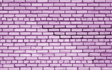 Fototapeta na wymiar Old brick wall surface in purple tone.