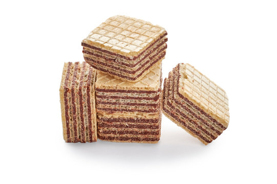 Stack of wafer biscuits cubes isolated on white background.