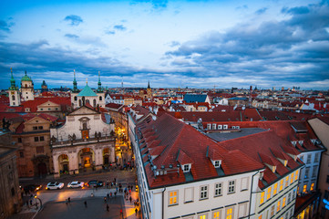 Fototapeta na wymiar View on the roofs in Stare Misto. Prague. Sunset