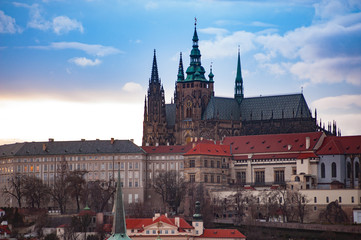 Obraz premium View on the red roofs of Mala Strana and St. Vitus Cathedral in Prague.
