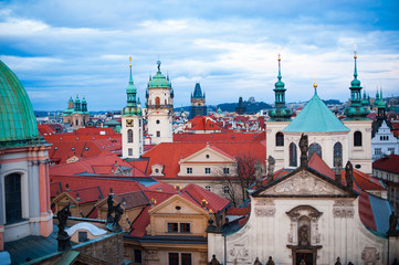 Fototapeta premium View on the roofs in Stare Misto. Prague. Sunset