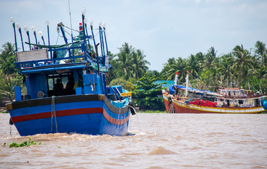 Fototapeta na wymiar Fishing boat in the Mekong Delta