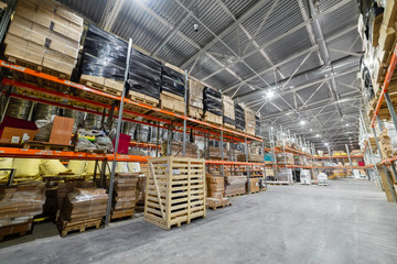 Long shelves with a variety of boxes and containers.