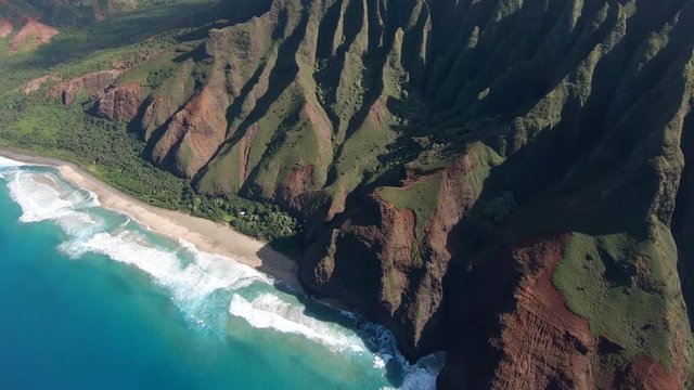 Helicopter tour of the Kalalau beach and valley on Na Pali coast in Hawaiian island of Kauai