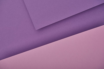 top view of purple laid out paper sheets with copy space