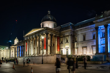 The National Gallery, Trafalgar Square at night in London, England, UK.