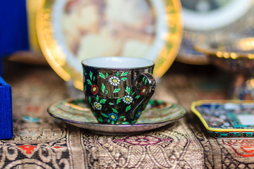 Black Vintage Thai's style porcelain teacup, coffee cup handmade. Set of Black coffee cup with black plate in Thai's style pattern painting.